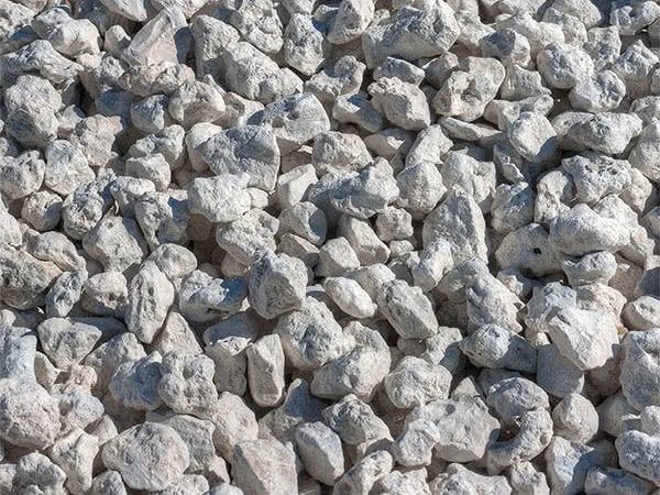 Specially sized leach rock for efficient water drainage systems, available at M Aggregates.